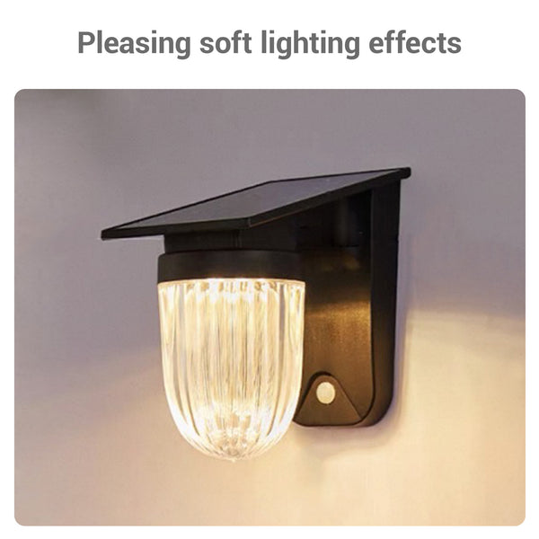 Futuristic black solar-powered planet light with milk cover, ideal for outdoor decor