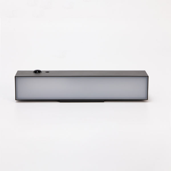 Australian-designed solar wall light, modern style for various outdoor settings.