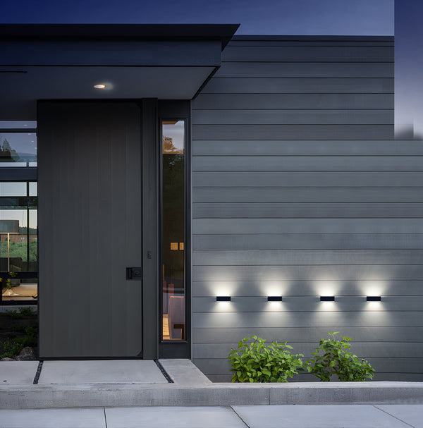Waterproof LED wall light, solar-powered for energy-efficient outdoor lighting.