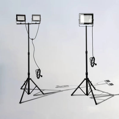 Two studio LED worklight on stands against a light gray background