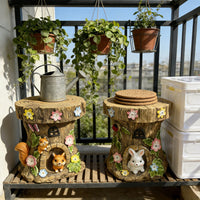 wooden stump stools with plants and a watering can in the background.