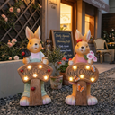 Solar rabbit ornament Couples set — Girl and Boy pair in front of caffe, LED glow at sunset