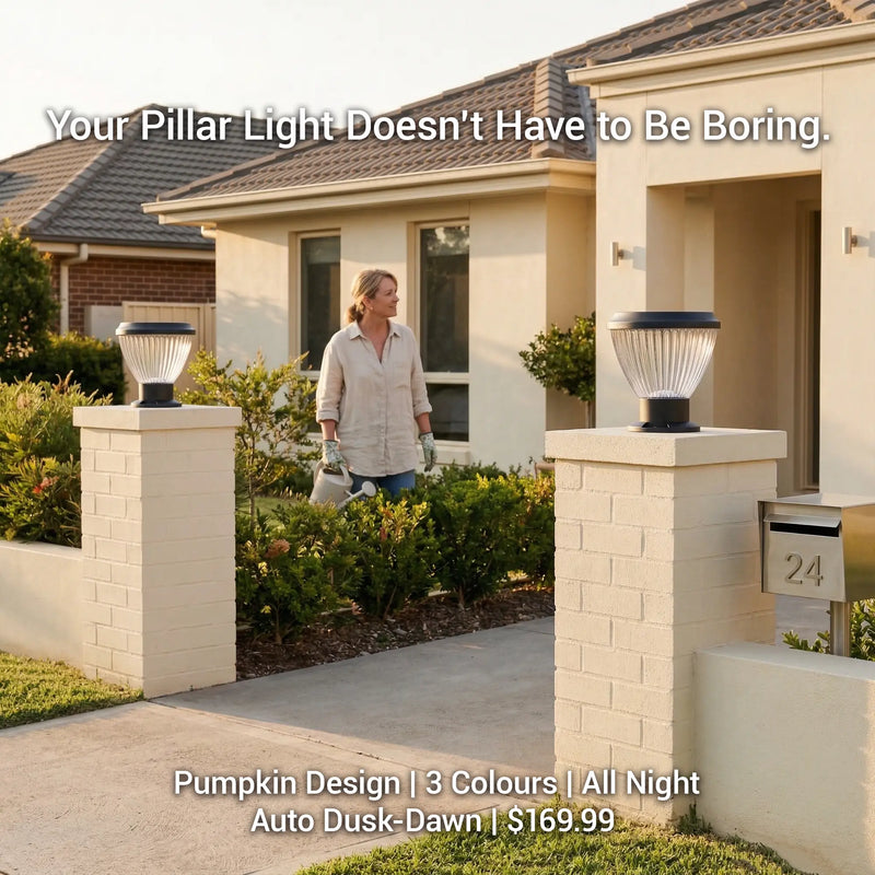 OUTWAY Priva PT0111 solar pillar cap lights on twin white brick entrance pillars of an Australian suburban home at golden hour with a woman watering plants and text overlay Your Pillar Light Doesnt Have to Be Boring Pumpkin Design 3 Colours All Night Auto Dusk-Dawn