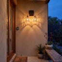 Entryway wall light with dual rattan shades beside glass door — creates welcoming glow for guests, featuring USB-C backup charging and synchronized breathing mode for seamless evening transitions.