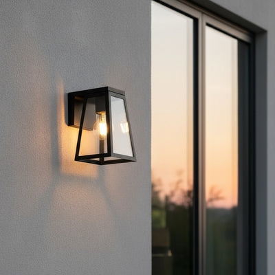 Modern outdoor wall light fixture on a gray wall