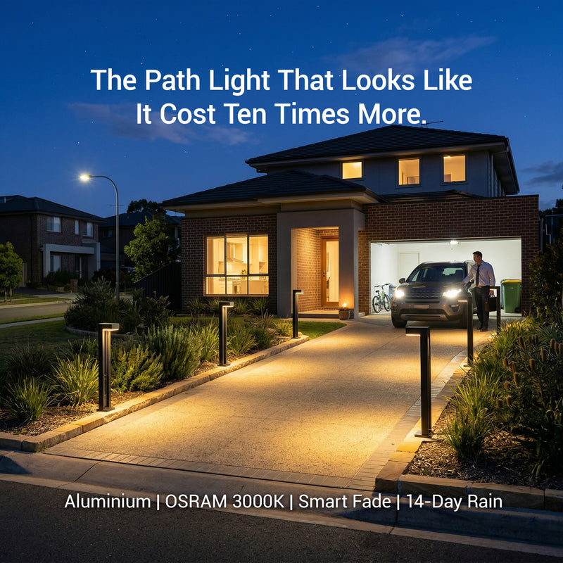 Modern house with well-lit driveway and pathway at night, featuring text about path light quality.