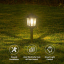 Solar garden light on grass with features highlighted