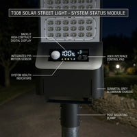 Detailed diagram of the T008 solar street light system components, labeling the LED status screen, PIR motion sensor, user control panel, gunmetal aluminum housing, and adjustable mounting bracket.