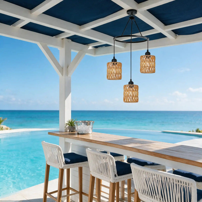 Natural bamboo shade chandelier above coastal pool bar under blue pergola