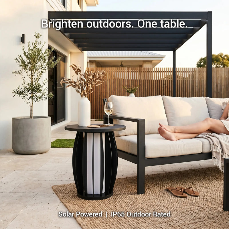 Outdoor patio setting with a solar-powered table and furniture.