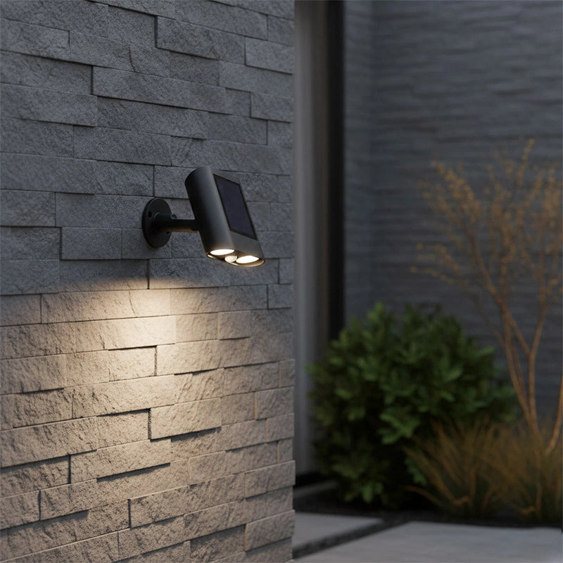 Solar spotlight mounted on a wall