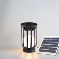 Black outdoor solar floor lamp with solar panel on a light gray background
