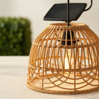 Detailed view of PT0913 PE rattan shade with E27 bulb inside — highlights intricate weave pattern and warm glow, showcasing durability and aesthetic appeal for outdoor use.