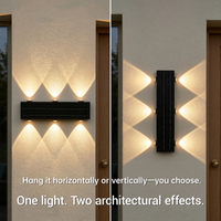 Modern wall-mounted light fixture on a textured wall with text indicating flexibility in installation direction.