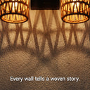PT0910 double rattan wall light two shades glowing overlapping woven shadow close up every wall tells a woven story