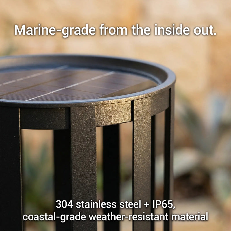 Metal table with text highlighting marine-grade material and weather-resistant properties.