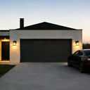 Outway solar wall light lighting a driveway