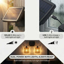 Solar-powered outdoor light fixture with USB charging option, shown on a wooden post and near a window.