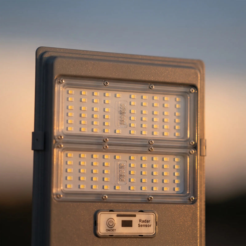Close-up detail of the OUTWAY T007 solar light panel showing the radar sensor, LED array, and durable aluminium housing.