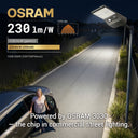 OSRAM street light illuminating a road with a woman getting into a car, highlighting the product's brightness and efficiency.