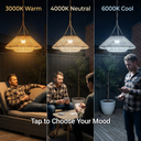Three-panel comparison showing a hanging pendant light in different color temperatures: 3000K warm yellow, 4000K neutral, and 6000K cool white. Each panel includes people in a backyard patio setting under the light, with text reading '3000K Warm,' '4000K Neutral,' '6000K Cool,' and 'Tap to Choose Your Mood.