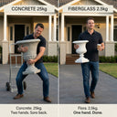 Side-by-side: man straining to lift 25kg concrete urn vs man one-handed carrying OUTWAY Flora fiberglass planter 2.5kg with coffee, caption: "Concrete. Two hands. Sore back. Flora. One hand. Done." — F004-flora-planter-vs-concrete-weight-comparison-2point5kg