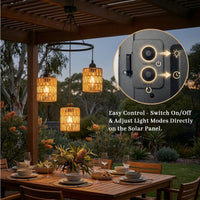 Outdoor setting with hanging lights and solar panel control unit.