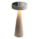 Wooden table lamp with a solar panel on top against a white background