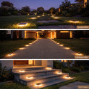 Three-panel collage showing solar-powered garden path and stair edge lights illuminated at dusk in real outdoor settings: a lawn path, a driveway edge, and concrete stairs leading to a house entrance.