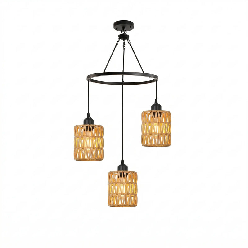 Studio shot of Haiku Trio solar chandelier with three woven rattan lanterns suspended from black metal ring frame against white background.