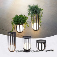 Set of modern indoor floor lamps with planters on a neutral background