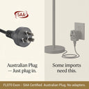 Australian plug and power adapter with SAA certification on a beige background
