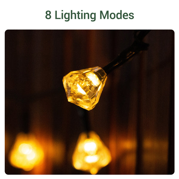 LED string solar fairy lights with a diamond-shaped bulb on a dark background with 8 Lighting Modes.