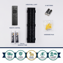 Solar-powered linear wall light kit shown on a white background with labeled components: remote control, linear wall light, two batteries, hardware pack, and two adhesive repair tubes. A row of feature icons along the bottom highlights free AU shipping, 1-year warranty, solar powered operation, IP65 waterproofing, and AU-based support.