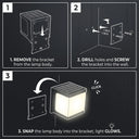 Three-step installation diagram for the PT0711 Cube solar wall light on dark background: Step 1 remove bracket, Step 2 drill and screw bracket to wall, Step 3 snap lamp body onto bracket until it clicks and glows.