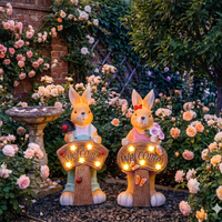 Boy and girl solar rabbit garden ornament couple set Welcome sign glowing warm LED lights rose garden outdoor Australia hand-painted bunny statue pair gift