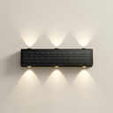 PT0802 solar wall wash light installed on an exterior wall, warm 3000K glow, aluminum alloy body