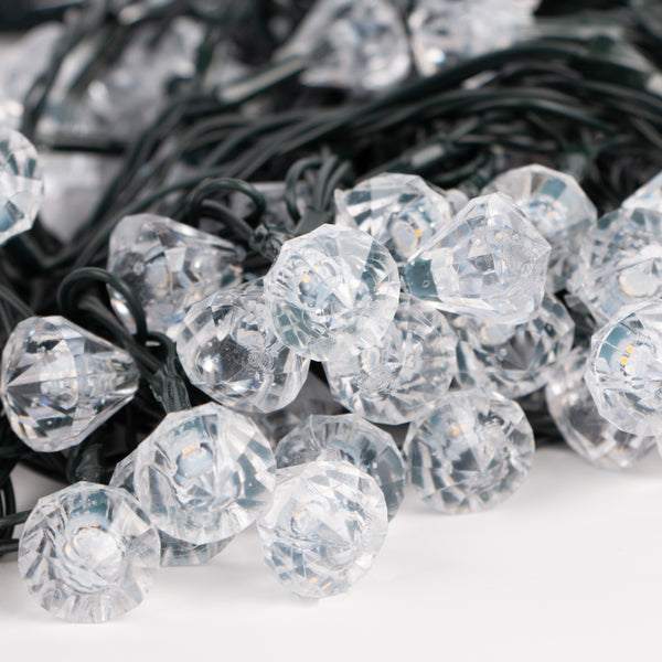 String solar fairy lights with clear diamond-shaped bulbs 