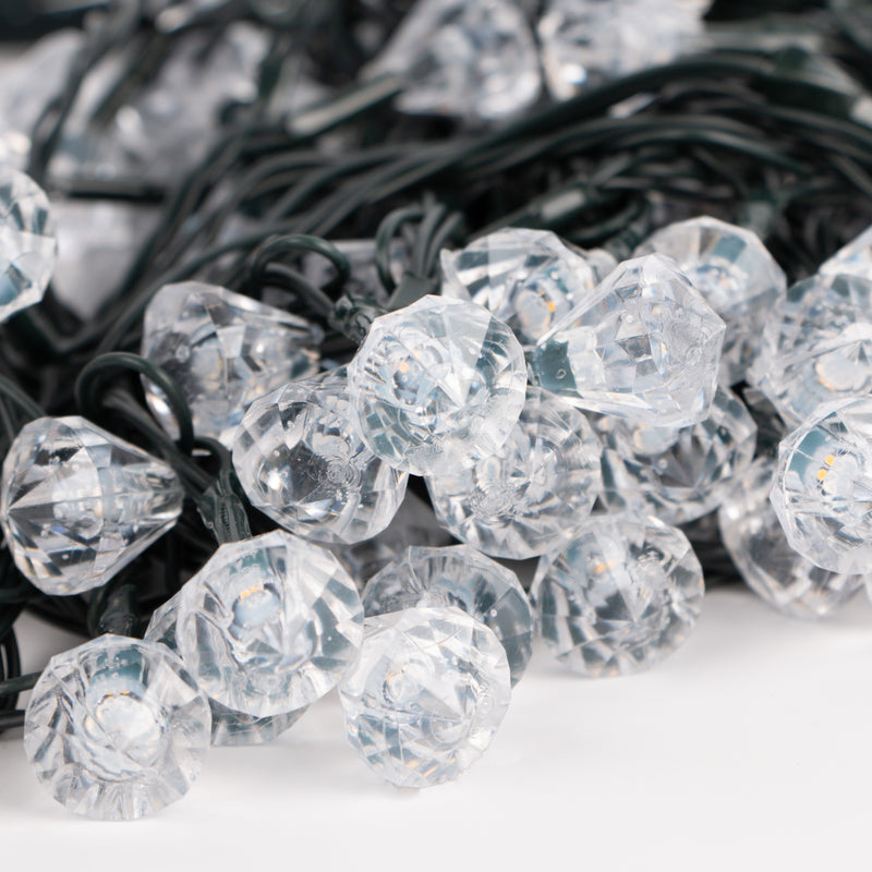 String solar fairy lights with clear diamond-shaped bulbs 