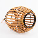 Solar lawn light with a black handle on a white background