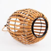 Solar lawn light with a black handle on a white background