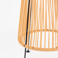 Close-up of a solar path lawn light with a black metal frame on a white background