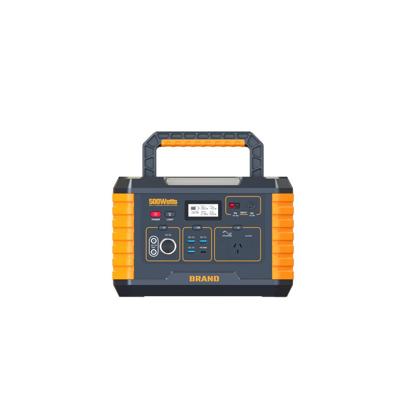 A portable power station with a dark gray body, bright orange side grips, and a top carrying handle, shown on a plain white background. The front features a digital display screen, multiple output ports, and the word 'BRAND' printed in yellow at the bottom.