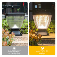 Solar pillar light with day and night functionality in a garden setting.
