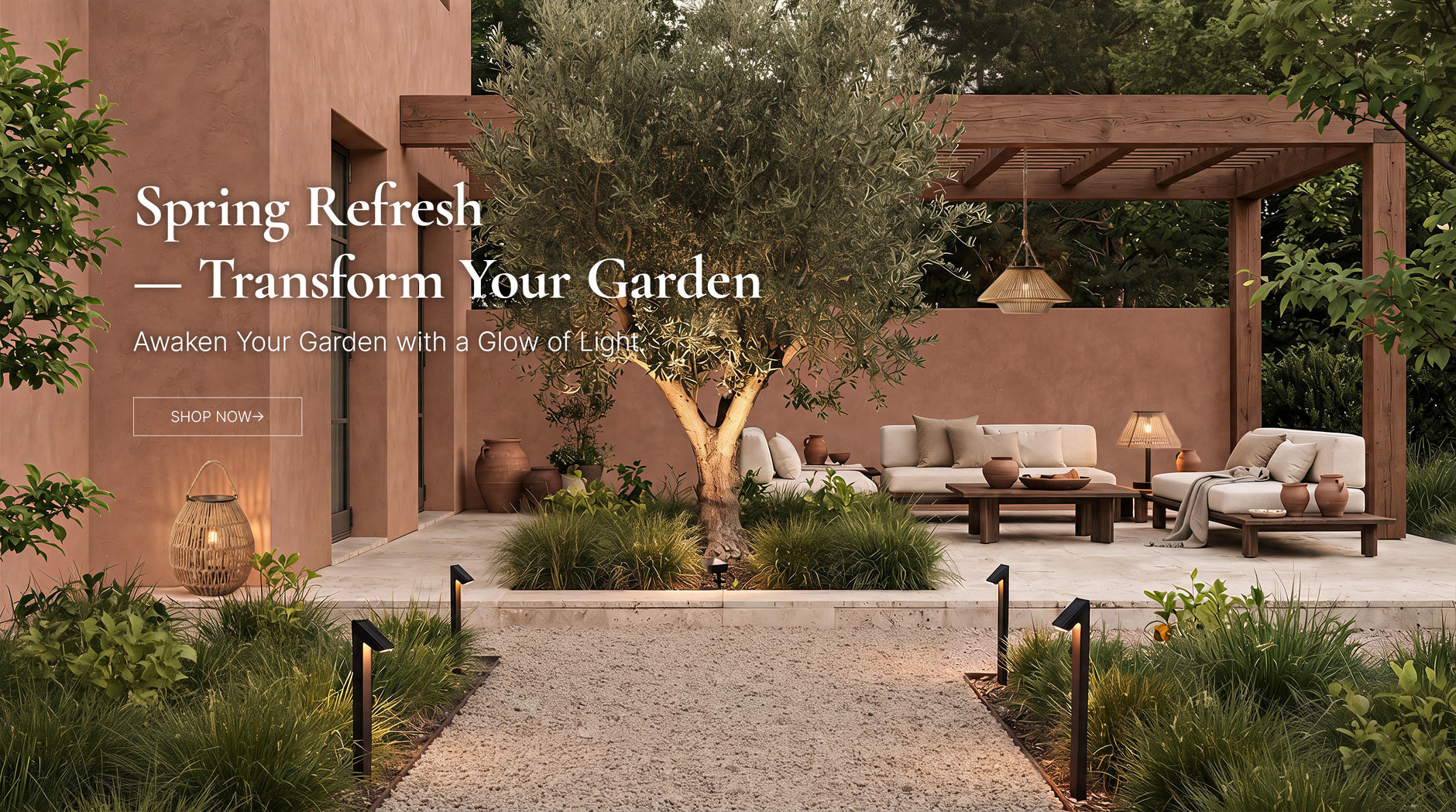 Outdoor patio and garden scene with a pergola, seating area, plants, and warm terracotta walls. Large overlaid text reads 'Spring Refresh — Transform Your Garden' with smaller copy below and a 'SHOP NOW' button.