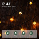 LED solar fairy lights with IP 43 rating for weather resistance, shown in rain.