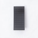 Energy-efficient outdoor lighting solution with a modern solar wall light design.