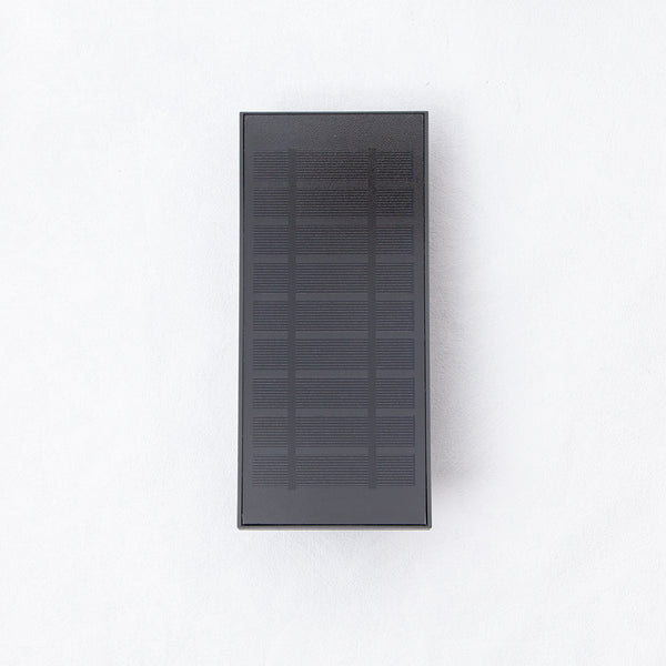 Energy-efficient outdoor lighting solution with a modern solar wall light design.
