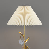 Elegant marble base offers stability and style.