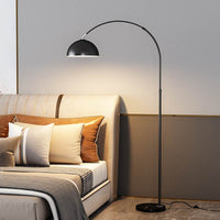 Sleek, durable metal arc floor lamp design.